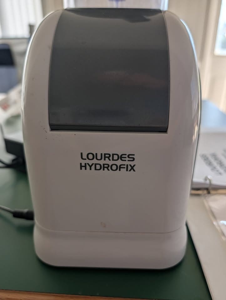 Lourdes Hydrofix hydrogen inhalation machine running on counter